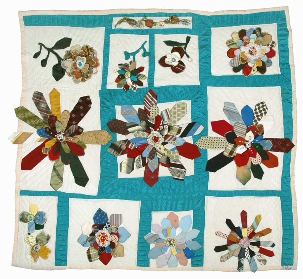 A flower garden is depicted in a handmade quilt