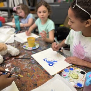 Girls create art in AMA classroom