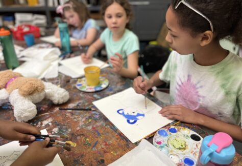 Girls create art in AMA classroom