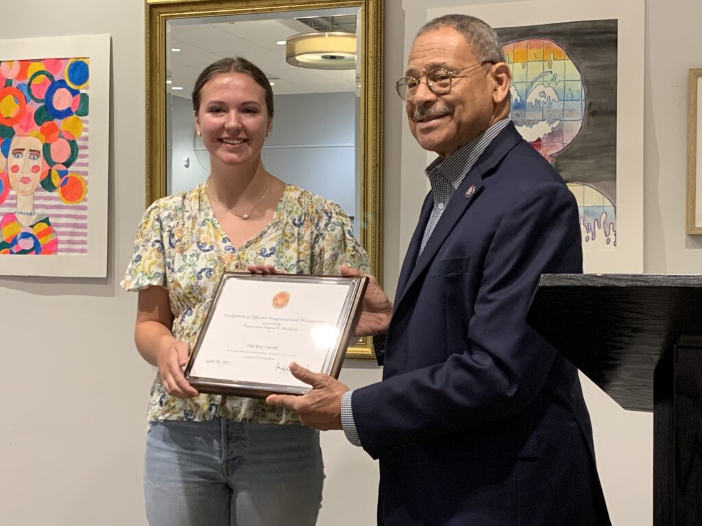 Congressman Sanford Bishop presents Ella Kate Carroll with honorable mention in the 2023 Congressional Art Competition