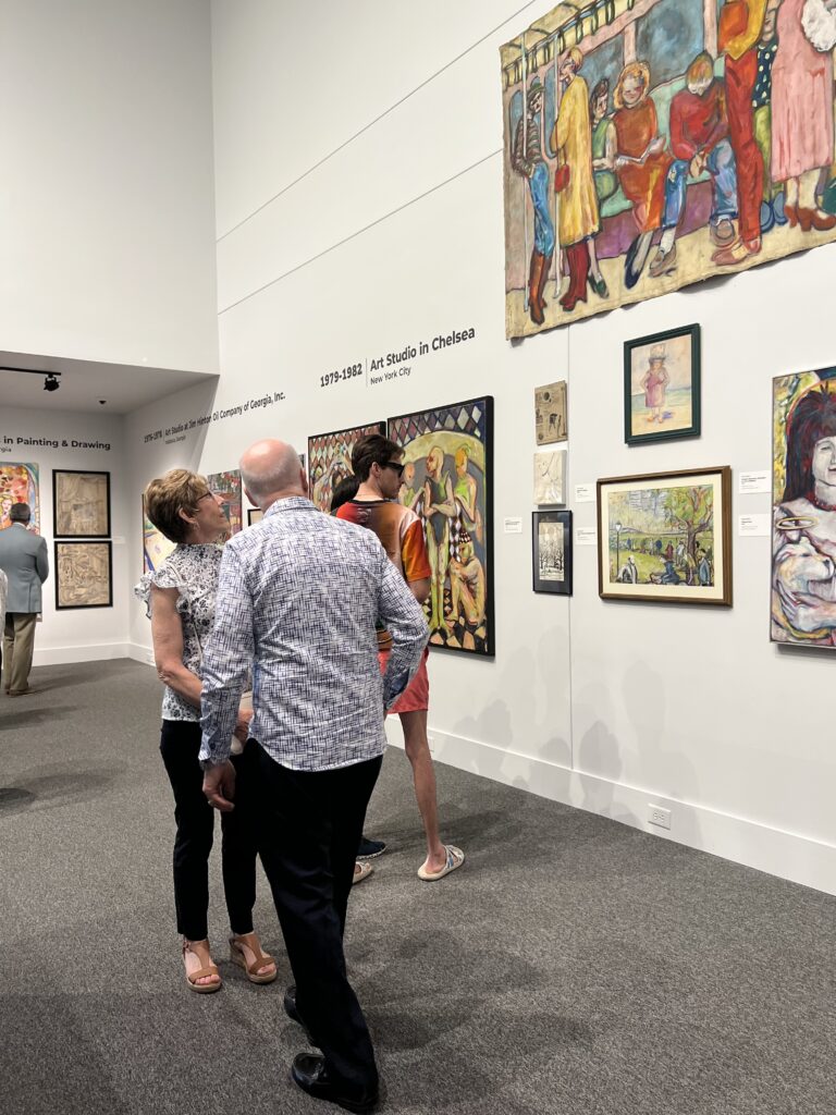 Albany Museum of Art members view works by Steve Hinton at the April 20, 2023, opening reception for members.