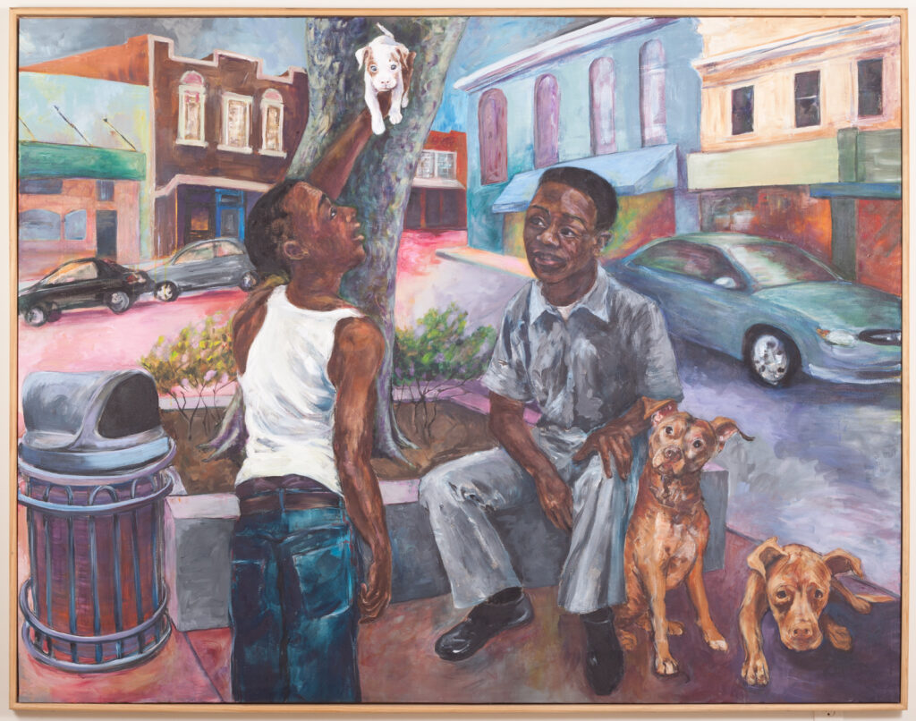 Two black kids sit in a cityscape with dogs as the younger child holds up a puppy he has selected