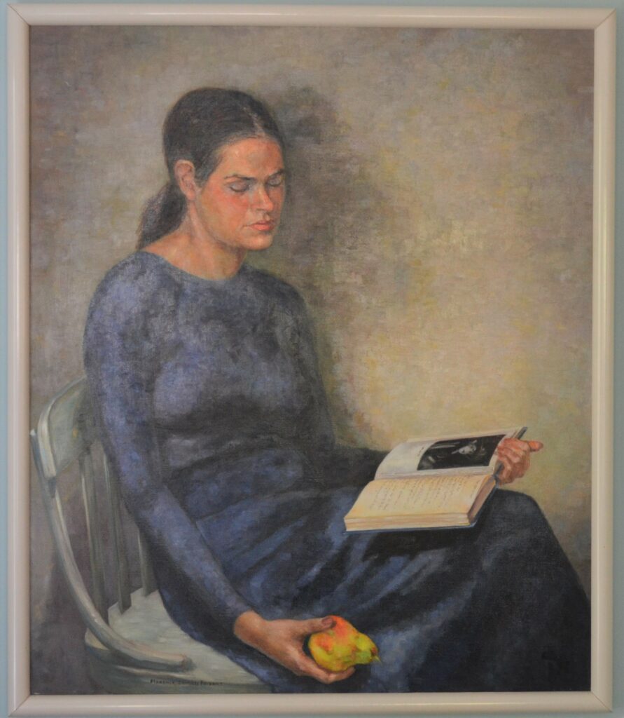 Pastel drawing of a woman sitting in a chair as she eats fruit and reads a book