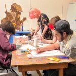 Teens create art in the AMA classroom